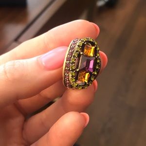 Heidi Daus - orange purple and green ring